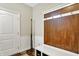 A mudroom features a built-in bench with storage, perfect for organization at 15410 Mission Hills Dr, Carmel, IN 46033