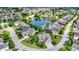Expansive aerial view showing pond access and a well-planned neighborhood layout at 15529 Mission Hills Dr, Carmel, IN 46033