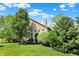 Picturesque backyard view with lush greenery and well-manicured lawn at 15529 Mission Hills Dr, Carmel, IN 46033