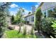 Well-maintained backyard featuring a patio area, lush greenery, and ample space for outdoor activities at 15529 Mission Hills Dr, Carmel, IN 46033