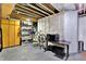 Spacious unfinished basement area with exposed ceiling and storage at 15529 Mission Hills Dr, Carmel, IN 46033