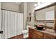 Bathroom featuring granite countertops, bronze fixtures, and a vessel sink at 15529 Mission Hills Dr, Carmel, IN 46033