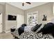 Bedroom with a view of the outdoors, a television, and a closet at 15529 Mission Hills Dr, Carmel, IN 46033