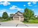 Beautiful two-story home with brick and siding exterior and attached two car garage at 15529 Mission Hills Dr, Carmel, IN 46033