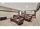 Finished home theater room with spacious layout and comfortable seating options at 15529 Mission Hills Dr, Carmel, IN 46033