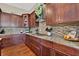Close-up of kitchen showing backsplash, stainless steel appliances, granite countertops, and gas range at 15529 Mission Hills Dr, Carmel, IN 46033