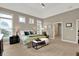 Bright main bedroom features a seating area, ensuite, and neutral decor at 15529 Mission Hills Dr, Carmel, IN 46033