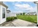 A view of the community backyard, with a well-maintained lawn at 15946 Marsala Dr, Fishers, IN 46037