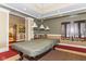 A community billiards room features a pool table and classic design elements at 15946 Marsala Dr, Fishers, IN 46037