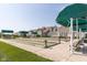 A manicured community recreation area features bocce ball courts near the clubhouse and covered benches at 15946 Marsala Dr, Fishers, IN 46037