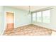 Bright dining area featuring a large window, tile flooring and light neutral walls at 15946 Marsala Dr, Fishers, IN 46037