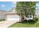 Charming single-Gathering home with a brick facade, a well-maintained lawn, and a two-car garage at 15946 Marsala Dr, Fishers, IN 46037