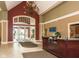 A view of the community lobby, with a reception desk and chandelier at 15946 Marsala Dr, Fishers, IN 46037