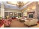 A view of the community lobby, with a fireplace and comfortable seating at 15946 Marsala Dr, Fishers, IN 46037