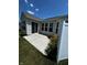 Concrete patio with sliding glass door access and garden, perfect for outdoor relaxation at 15946 Marsala Dr, Fishers, IN 46037