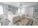 Charming bedroom with two twin beds, a ceiling fan, and light blue walls at 1870 Broadleaf Ct # 10, Greenwood, IN 46143