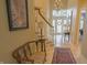 Spacious foyer featuring a staircase, marble flooring, a decorative rug, and a chandelier, creating a grand entrance at 1870 Broadleaf Ct # 10, Greenwood, IN 46143