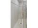Modern shower with tile walls, built-in seating, and glass door at 1870 Broadleaf Ct # 10, Greenwood, IN 46143