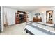 Carpeted bedroom with wood furnishings and open door to another room and large closet at 2020 Treving Dr, Cicero, IN 46034