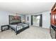 Spacious bedroom with decorative headboard, light grey walls, and neutral carpet at 2020 Treving Dr, Cicero, IN 46034