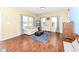 Bright living room featuring hardwood floors, comfortable seating, and abundant natural light at 2020 Treving Dr, Cicero, IN 46034