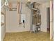 Basement mechanical room featuring modern water heater and HVAC system at 21491 Raccoon Ct, Noblesville, IN 46062