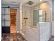 Modern bathroom with glass shower enclosure and tile backsplash at 21491 Raccoon Ct, Noblesville, IN 46062