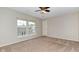Bedroom featuring windows for natural light and a ceiling fan at 21491 Raccoon Ct, Noblesville, IN 46062