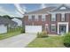 Lovely brick home with a two-car garage and long driveway, set in a quiet neighborhood at 21491 Raccoon Ct, Noblesville, IN 46062