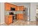 Well-equipped kitchen with granite countertops, stainless steel appliances, and ample cabinet space at 21491 Raccoon Ct, Noblesville, IN 46062