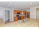 Updated kitchen with stainless steel appliances, granite countertops, and modern lighting at 21491 Raccoon Ct, Noblesville, IN 46062