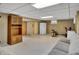Finished basement area featuring wood paneling, neutral colors and includes recreational equipment at 241 Wehmeier St, Columbus, IN 47201
