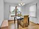 Bright dining room featuring a wooden table, cozy seating, and natural light, perfect for intimate meals at 241 Wehmeier St, Columbus, IN 47201