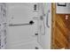 Walk-in shower with grab bar, showerhead, and shelves, with wood paneling at 241 Wehmeier St, Columbus, IN 47201