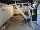 Unfinished basement with painted walls offers potential for customization at 2507 S Keystone Ave, Indianapolis, IN 46203