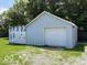 Detached garage with siding offers parking and storage space at 2507 S Keystone Ave, Indianapolis, IN 46203