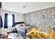 Cozy bedroom featuring a comfortable bed and decorative string lights at 26 E Plum St, Anderson, IN 46012