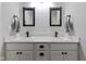 Modern bathroom featuring double sinks, sleek fixtures, and stylish vanity with matte black hardware at 2733 Lamar Dr, Whitestown, IN 46075