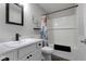 Neat bathroom with vanity, framed mirror and a shower with a decorative shower curtain at 2733 Lamar Dr, Whitestown, IN 46075