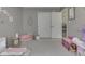 Adorable bedroom with a small sofa and a closet at 2734 Newaygo Dr, Indianapolis, IN 46217