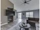 Open living room features a large TV, neutral color palette, and inviting seating arrangement at 2734 Newaygo Dr, Indianapolis, IN 46217