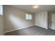 Cozy bedroom with carpet, window, and spacious closet at 3019 E Berwyn St, Indianapolis, IN 46203