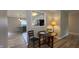 Cozy dining area with views into the kitchen through the architectural cut-out at 3019 E Berwyn St, Indianapolis, IN 46203