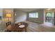 Dining area with natural lighting, table and chairs, with view to front yard at 3019 E Berwyn St, Indianapolis, IN 46203