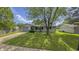 Charming home with attached garage, well-manicured lawn and established landscaping at 3019 E Berwyn St, Indianapolis, IN 46203