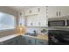 Charming kitchen with stainless steel appliances and butcher block countertops at 3019 E Berwyn St, Indianapolis, IN 46203