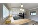 Renovated kitchen with stainless appliances, white cabinets, butcher block countertop, and a tiled floor at 3019 E Berwyn St, Indianapolis, IN 46203