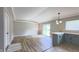 Open living space with modern kitchen, natural light, and stylish flooring at 3019 E Berwyn St, Indianapolis, IN 46203