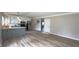 Open-concept living and kitchen area with stylish flooring and natural light at 3019 E Berwyn St, Indianapolis, IN 46203