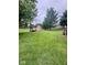 Large backyard with a shed, ideal for outdoor activities at 3130 Taylor Rd, Columbus, IN 47203
